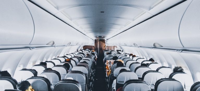 Photo of inside of an airplane to help argue for childfree flights.